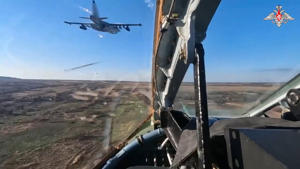 In this photo taken from video released by the Russian Defense Ministry Press Service on Wednesday, Dec. 13, 2023, Su-25 ground attack jets fire rockets during a Russian air force mission in Ukraine. After blunting Ukraine's counteroffensive from the summer, Russia is building up its resources for a new stage of the war over the winter, which could involve trying to extend its gains in the east and deal significant blows to the country's vital infrastructure. Russia has ramped up its pressure on Ukrainian forces on several parts of the more than 1,000-kilometer (620-mile) front line. (Russian Defense Ministry Press Service via AP)