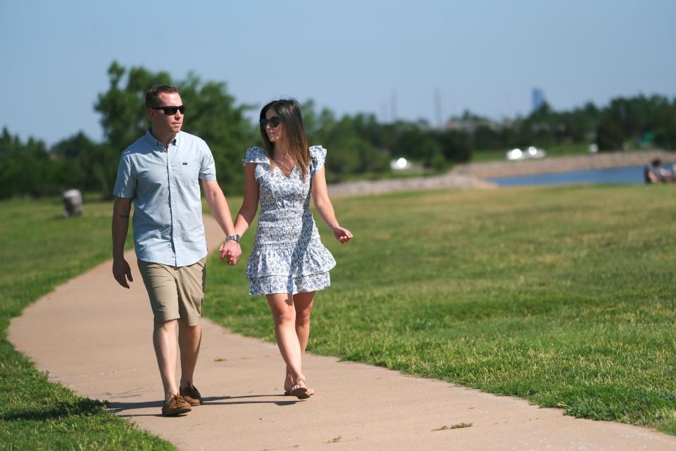 Meghan and Austin Langlois, of Virginia Beach went to Oklahoma City to be with the expectant mom ahead of the birth of the child.
