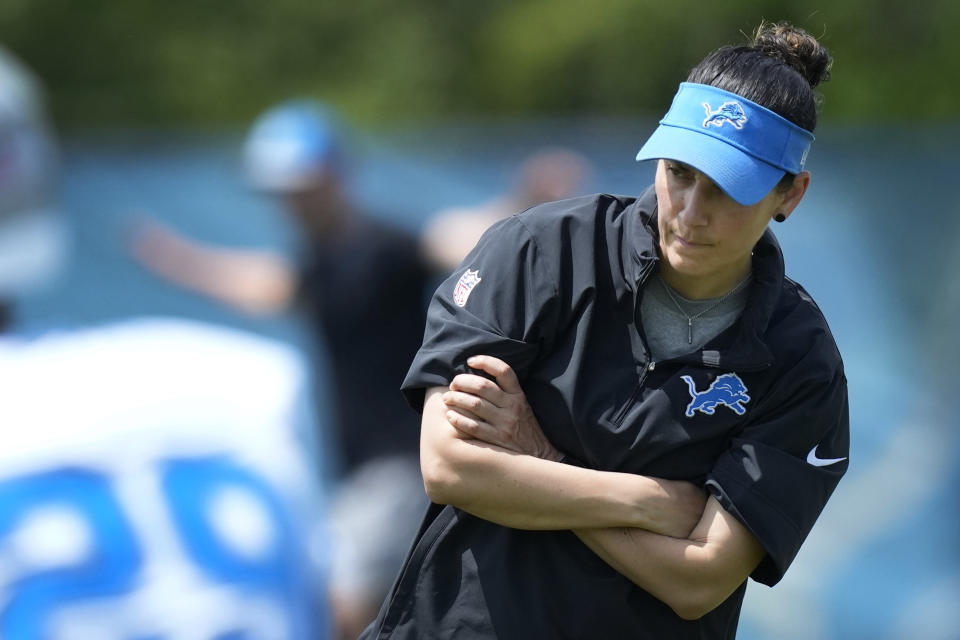 Detroit Lions Director of Sports Medicine Jill Costanza watches an NFL football practice, Tuesday, June 4, 2024, in Allen Park, Mich. Costanza’s interest in studying ACL injuries and passion for learning new ways to improve performance led the former high school basketball coach and PE teacher on a journey from college sports to the Army to the Air Force to the NFL. Now, she’s an asset for a team with Super Bowl aspirations. (AP Photo/Carlos Osorio)