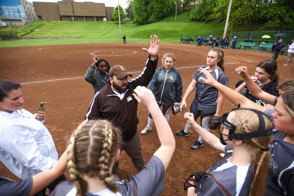 Roger Bacon softball coach Joey Barrow views softball from more than just wins and losses. The two-time brain cancer survivor and Iraq War veteran has a lot of life lessons to offer.