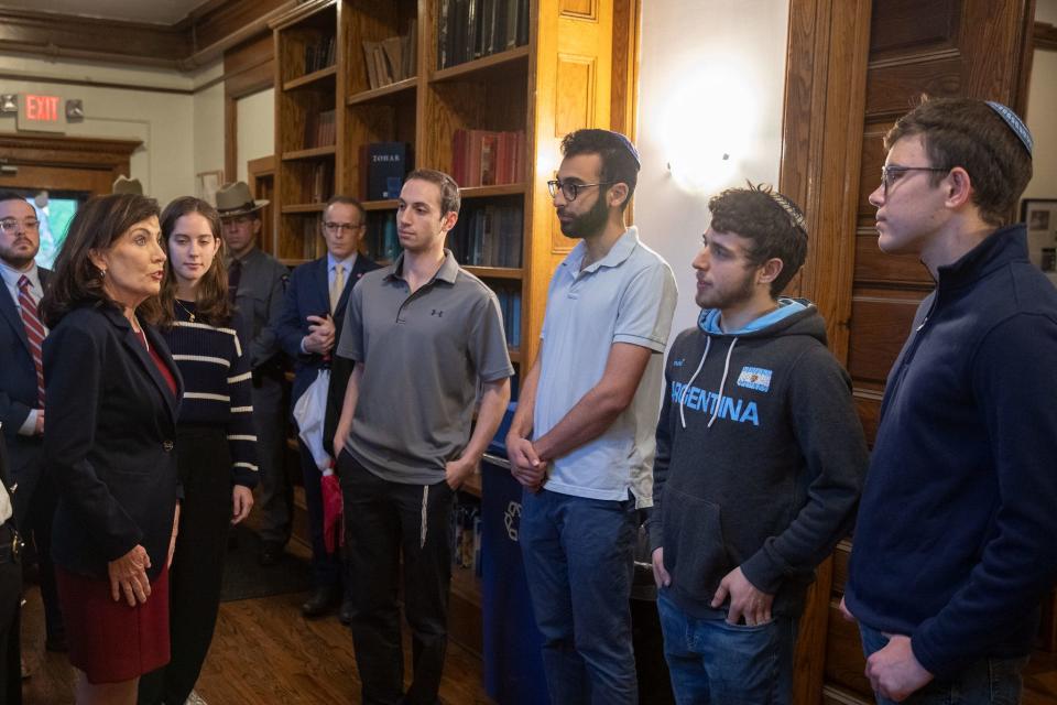 Gov. Kathy Hochul, left, speaks with students during a visit to Cornell University’s Center for Jewish Life on Monday, Oct. 30, 2023. Hochul conducted a roundtable discussion with students addressing recent antisemitic threats made online.