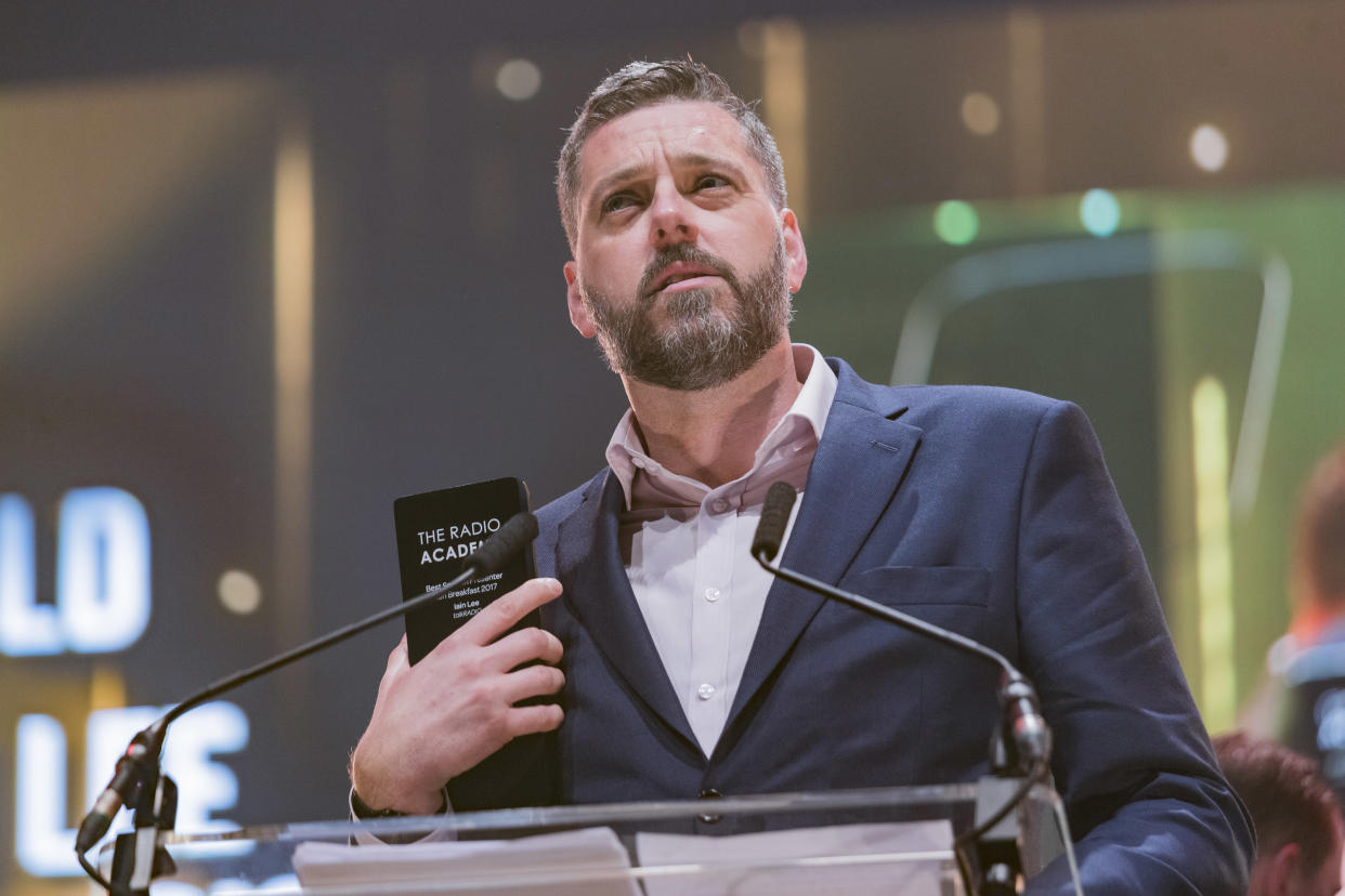 LEEDS, ENGLAND - OCTOBER 19:  Iain Lee wins an award at the Audio & Radio Industry Awards at First Direct Arena Leeds on October 19, 2017 in Leeds, England.  (Photo by Andrew Benge/Redferns)