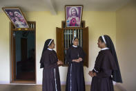 In this Sunday, Nov. 4, 2018, photo, Sister Josephine Villoonnickal, left, sister Alphy Pallasseril, center, and Sister Anupama Kelamangalathu, who have supported the accusation of rape against Bishop Franco Mulakkal talk at St. Francis Mission Home, in Kuravilangad in southern Indian state of Kerala. For decades, nuns in India have quietly endured sexual pressure from Catholic priests, an AP investigation has revealed. (AP Photo/Manish Swarup)