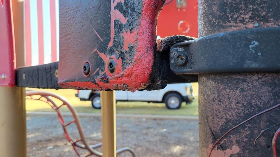 The floor framing on the playground equipment was also damaged after someone set fire to it.