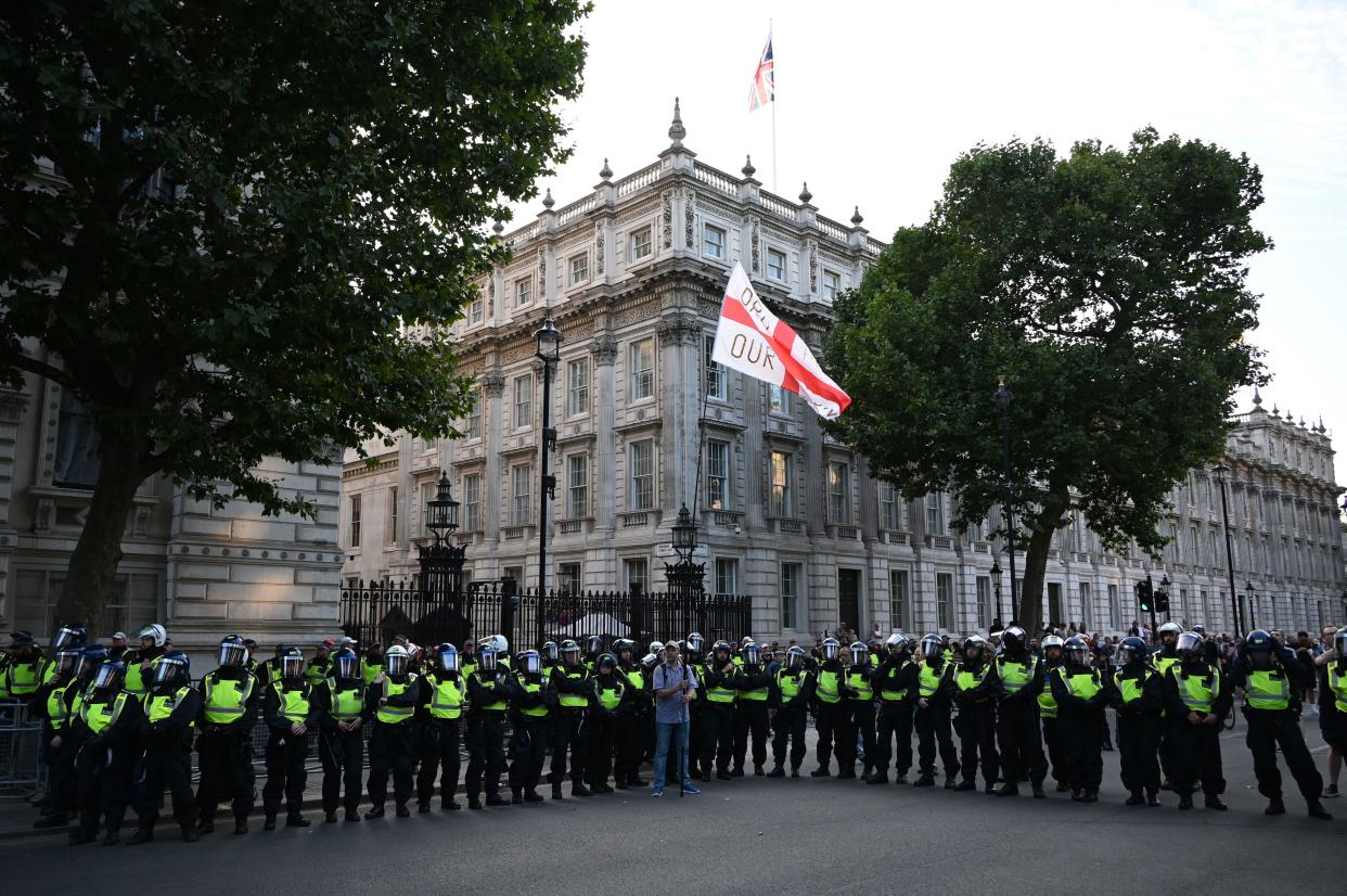 LONDON, ENGLAND - JULY 31 2024: Angry protesters clashed with police following the stabbing incident in Southport outside Downing Street. The angry protestors are not entirely wrong. About knife crimes and violent migrants. Which protestors are expressing their intention to target local kids and groom gangs in the UK? Is it not right to protect your own children? It's a shame that the UK has become a country that oppresses all communities, making peace impossible. Every community and individual is judged by their appearance in London, UK. ( Credit: See Li/Picture Capital/Alamy Live News