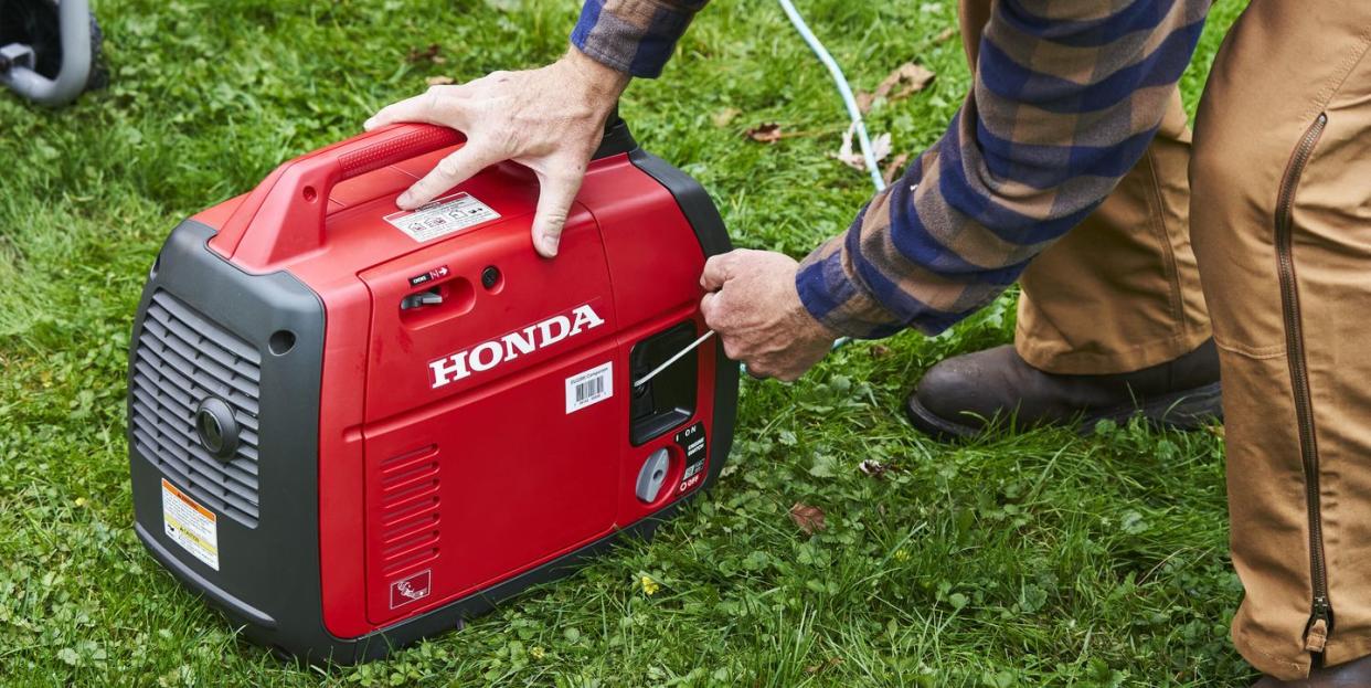 brad pulling cord on honda generator