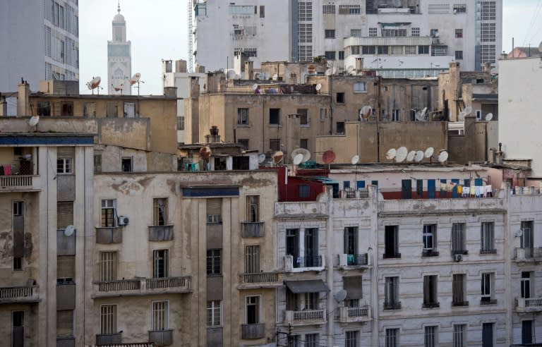 Clotheslines, satellite dishes and tangled cables have sprouted on the deteriorating facades of central Casablanca's buildings, constructed nearly a century ago under French rule