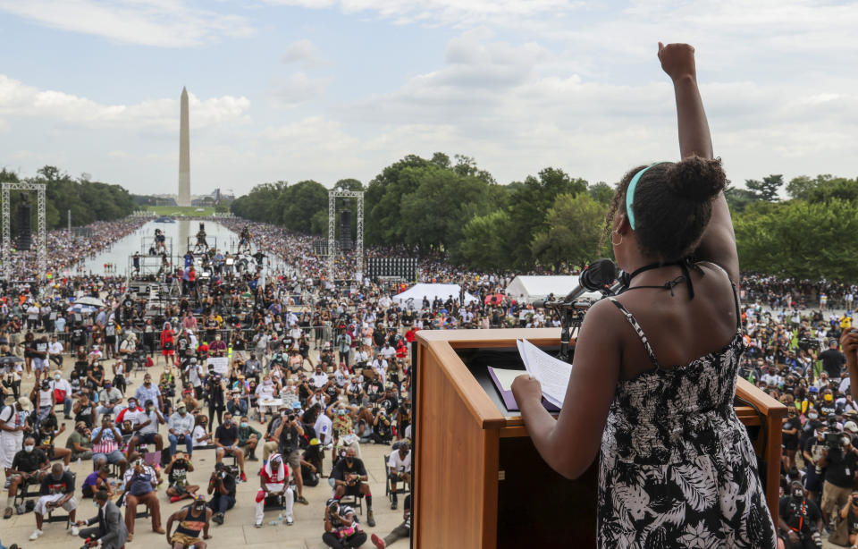 FILE - Yolanda Renee King, granddaughter of The Rev. Martin Luther King Jr., raises her fist as she speaks during the March on Washington, on the 57th anniversary of the Rev. Martin Luther King Jr.'s "I Have a Dream" speech on Aug. 28, 2020. Although there is still debate among historians about when exactly the practice began, chattel slavery in what would become the U.S. dates back to 1619 when about 20 enslaved Africans were brought to Jamestown, Va. — then a British colony. (Jonathan Ernst/Pool Photo via AP, File)