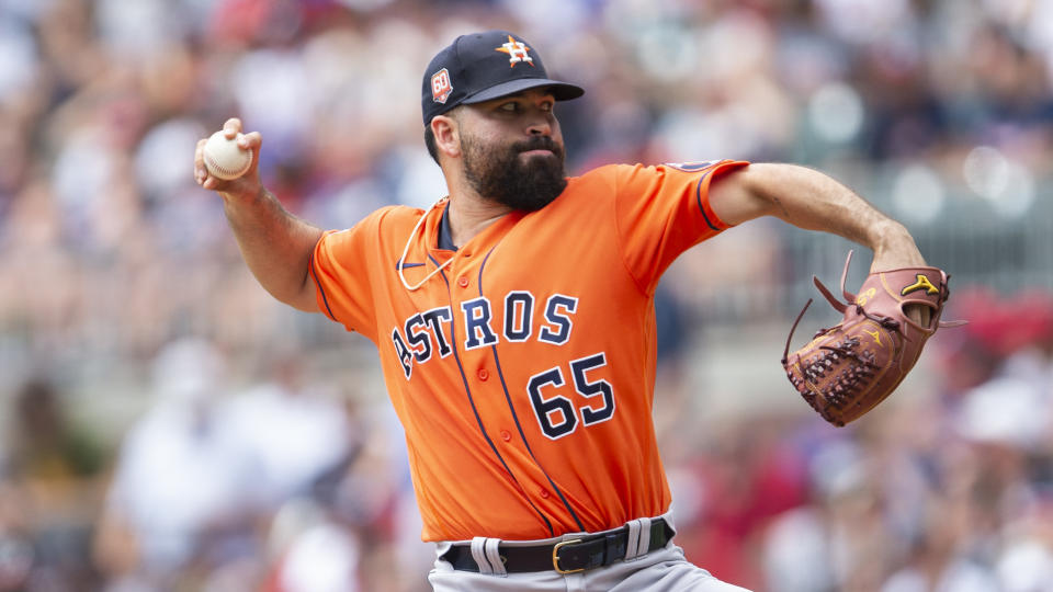 Houston Astros starting pitcher Jose Urquidy throws against the Atlanta Braves in the first inning of a baseball game Sunday, Aug. 21, 2022, in Atlanta. (AP Photo/Hakim Wright Sr.)