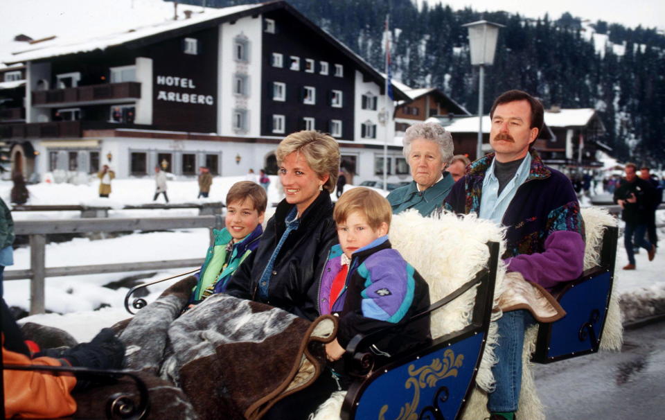 AUSTRIA - MARCH 30:  Princess Diana With Prince William And Prince Harry In A Sleigh In Austria.in The Back Are The Prince's Nanny Olga Powell And Police Bodyguard Trevor Bettles  (Photo by Tim Graham Photo Library via Getty Images)