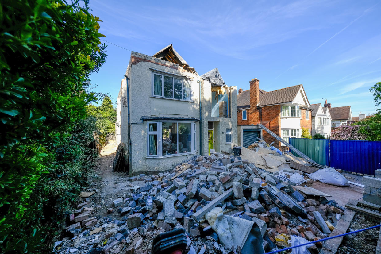 GV of the detached property on Guilford Road in Stoneygate, Leicester, which has been left with its roof missing and rubble scattered all around it after a builder decided to undo the work he'd done following a row about cash.  June 8, 2021.  See SWNS story SWMDhouse.  Properties on the pleasant tree-lined avenue average at more than Â£540,000. 