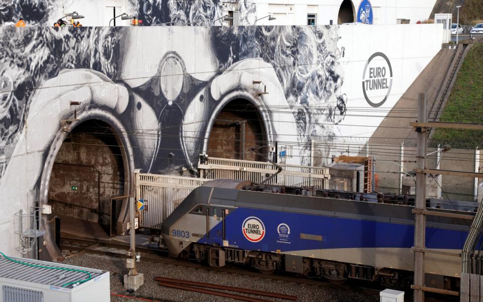 A Eurotunnel freight shuttle enters the Channel Tunnel in Coquelles, near Calais