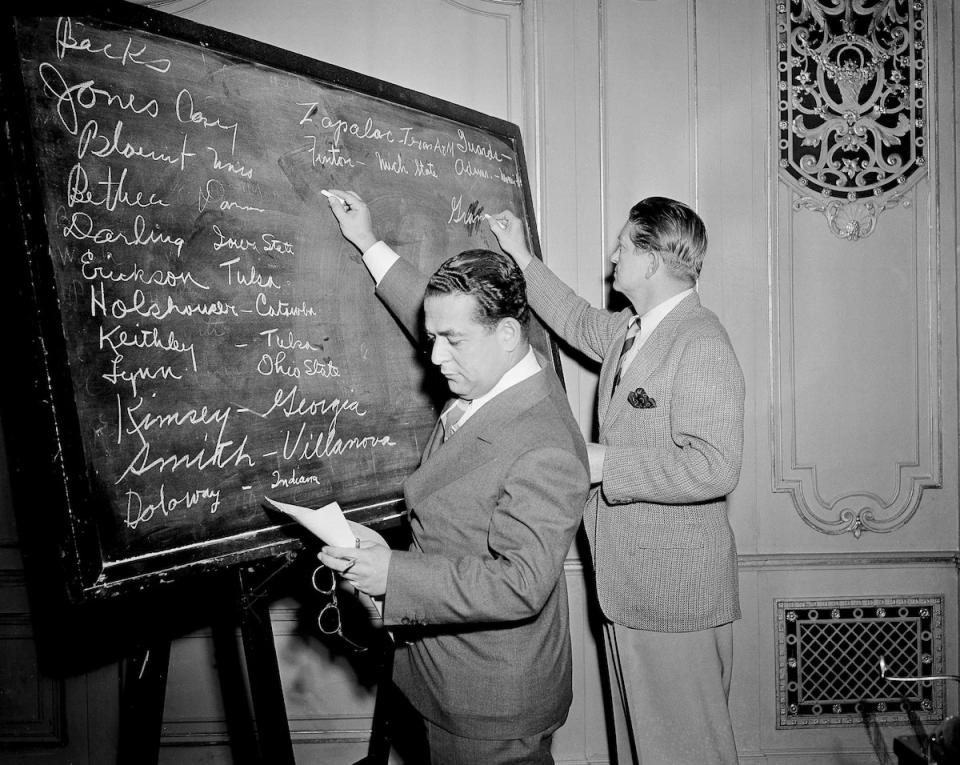 For decades, as in 1943, the NFL draft was a relatively unattended, entirely untelevised affair. (Harry L. Hall/AP)