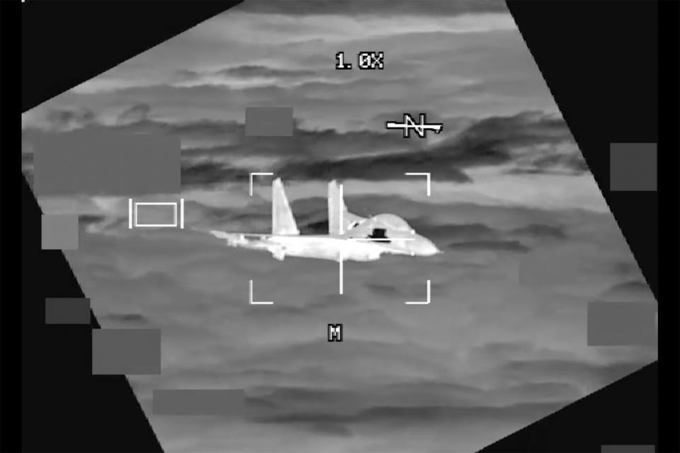 FILE - In this image made from video provided by U.S. Indo-Pacific Command, a People's Republic of China J-11 is seen from a U.S. Air Force B-52 aircraft, over the South China Sea on Oct. 24, 2023. (U.S. Indo-Pacific Command via AP, File)