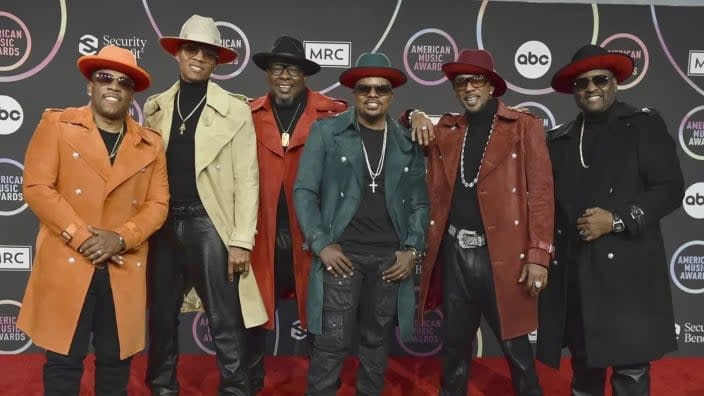 Members of New Edition — (from left) Michael Bivins, Ronnie Devoe, Bobby Brown, Ricky Bell, Ralph Tresvant and Johnny Gill — appear in the press room at the 2021 American Music Awards in Los Angeles. (Photo: Jordan Strauss/Invision/AP, File)