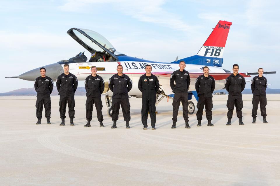 The USAF Viper Demonstration Team standing proudly in front of their commemorative jet on the dry lakebed at the famed Edwards AFB, the place of the F-16's first flight 50 years ago. (USAF Viper Demo Team)