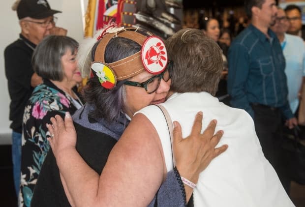 Ontario Regional Chief RoseAnne Archibald gets a hug after the closing ceremony of the AFN's Annual General Assembly in Fredericton, N.B., Thursday, July 25, 2019. (Stephen MacGillivray/The Canadian Press - image credit)