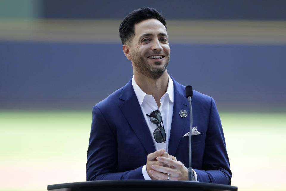 Former Milwaukee Brewers player Ryan Braun smiles as he gives his retirement speech before a baseball game between the Brewers and the New York Mets, Sunday, Sept. 26, 2021, in Milwaukee. (AP Photo/Aaron Gash)