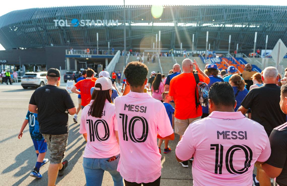 Soccer fans walk outside TQL Stadium wearing Lionel Messi jersey before the start of the U.S. Open Cup semifinal game between Inter Miami vs FC Cincinnati on Wednesday, Aug. 23, 2023, in Cincinnati, Ohio.