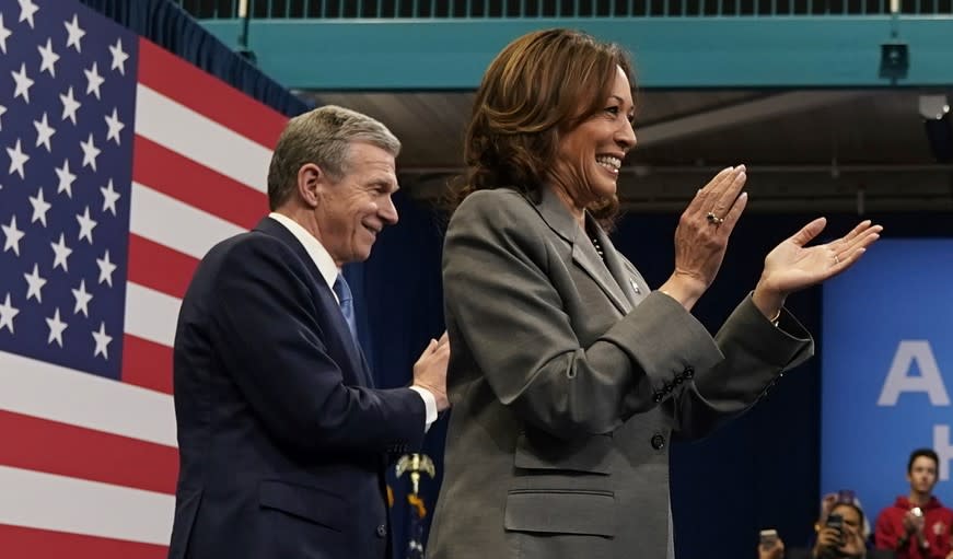Vice President Kamala Harris (right) and Gov. Roy Cooper, D-N.C. in Raleigh, N.C., Tuesday, March 26, 2024. (AP Photo/Stephanie Scarbrough)