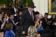 FILE - Paul Pelosi, husband of Rep. Nancy Pelosi, D-Calif., stands up to be recognized before President Joe Biden welcomes the 2022 NBA champions, the Golden State Warriors, to the East Room of the White House in Washington, on Jan 17, 2023. Footage of the attack on former U.S. House Speaker Nancy Pelosi's husband could be released as early as Thursday, Jan. 26, 2023. A California judge ruled on Wednesday there was no reason to keep the footage secret despite prosecutors' objections. (AP Photo/Susan Walsh, File)