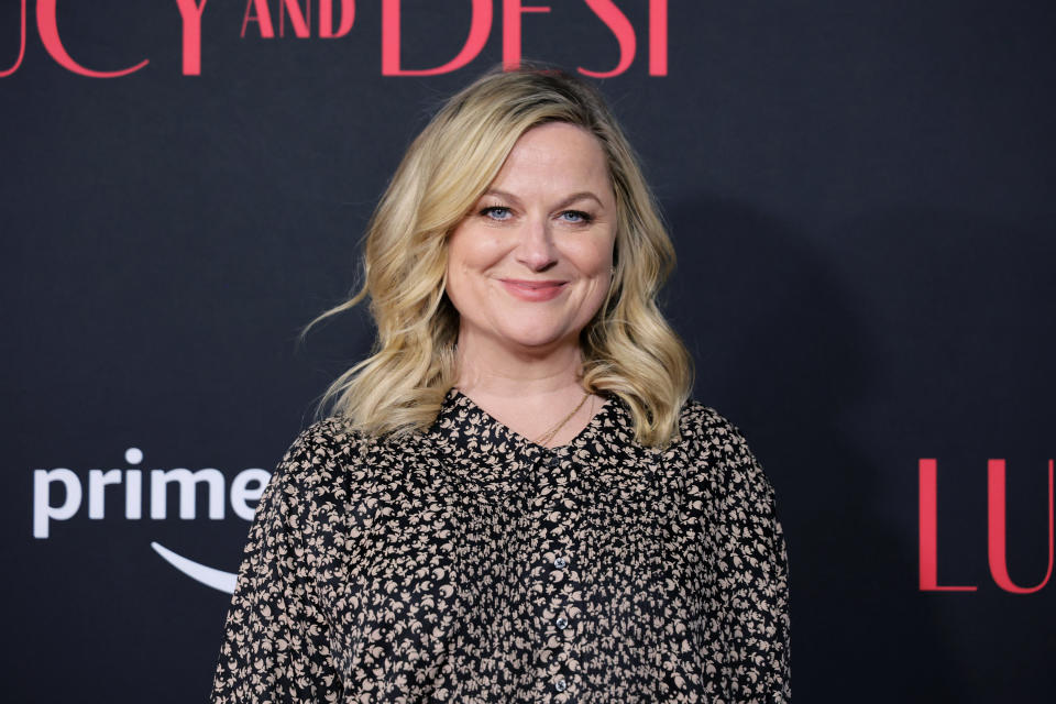 Amy Poehler smiles at the "Lucy and Desi" premiere in Los Angeles