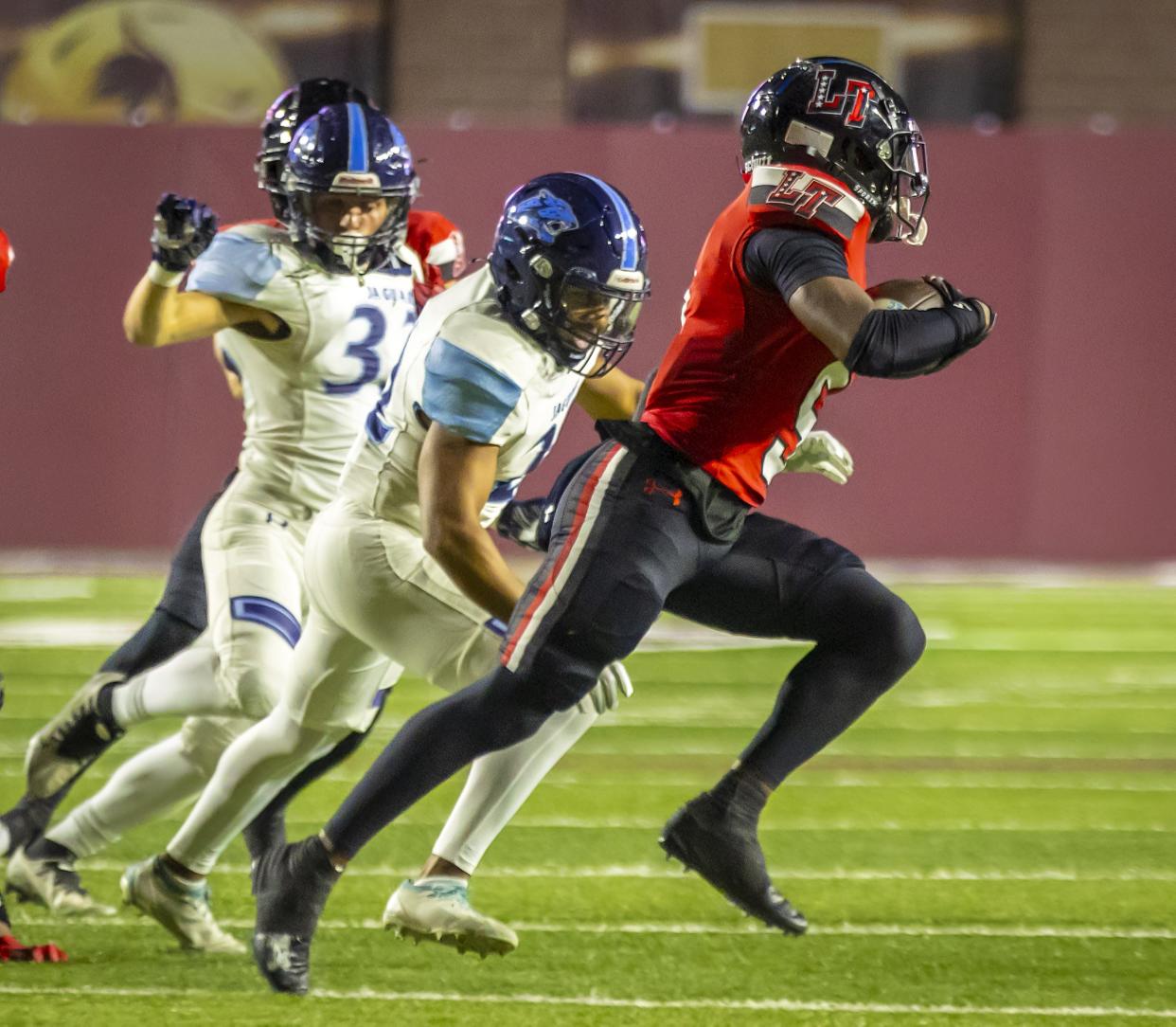 Lake Travis senior receiver and special teams contributor Josiah Estes, breaking free against Johnson, has found a new home at the University of San Diego.