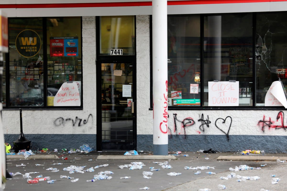 A South Carolina Shell station was vandalised after the owner shot dead a 14-year-old boy on Sunday (Associated Press)