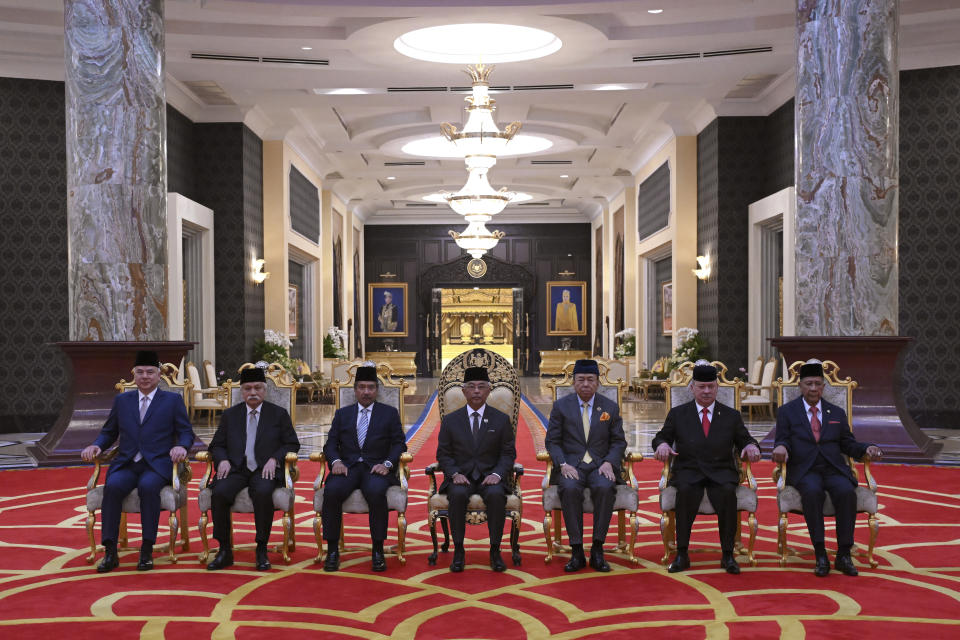 From left to right, Sultan Nazrin Muizzuddin Shah of Perak, Sultan Muhriz Munawir of Negeri Sembilan, Sultan Mizan Zainal Abidin of Terengganu, Malaysia's King Sultan Abdullah Sultan Ahmad Shah, Sultan Sharafuddin Idris Shah of Selangor, Sultan Ibrahim Iskandar of Johor and Sultan Sallehuddin Badlishah pose for pictures before the election for the next Malaysian king at the National Palace in Kuala Lumpur Friday, Oct. 27, 2023. Malaysia's royal families have elected the powerful and wealthy ruler of southern Johor state as the country's new king under a unique rotating monarchy system, the palace said Friday. Sultan Ibrahim Iskandar, 64, will ascend to the throne on Jan. 31 for a five-year term. the palace said in a statement(Mohd Rasfan/Pool Photo via AP)