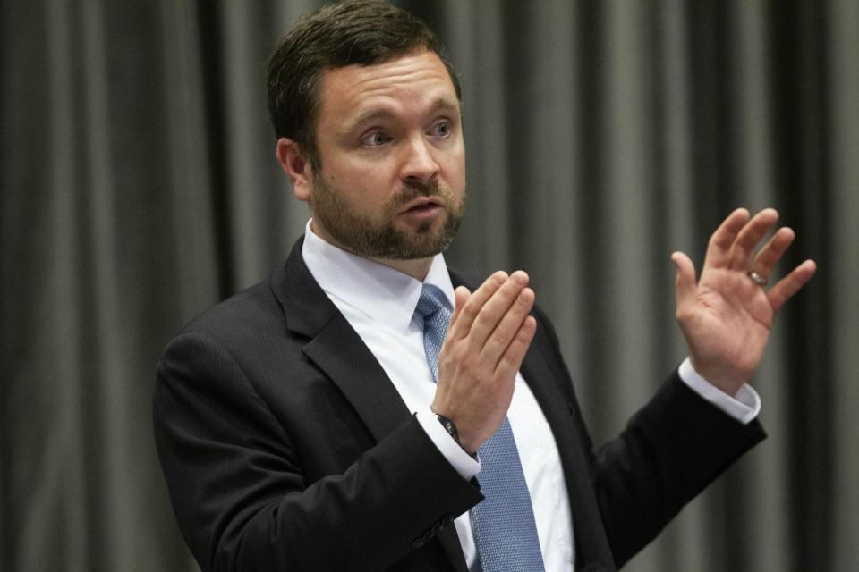 John Branch, an attorney for the Mark Harris campaign committee, explains why he submitted new documents into evidence during the fourth day of a public evidentiary hearing on the 9th Congressional District voting irregularities investigation Thursday, Feb. 21, 2019, at the North Carolina State Bar in Raleigh. (Travis Long/The News & Observer via AP)