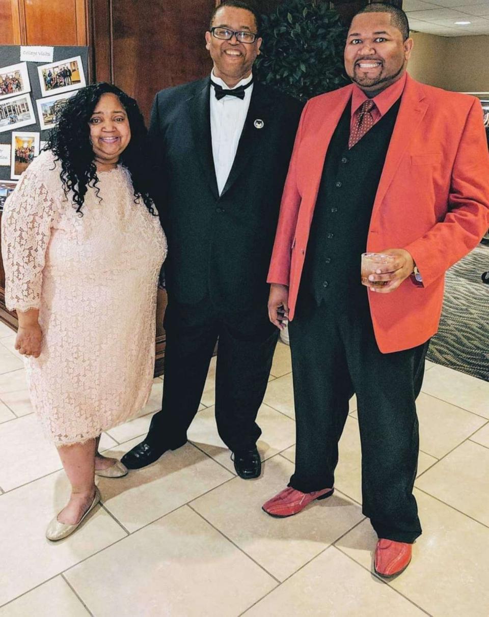 PHOTO: Dawn LaGuerre, left, David LaGuerre Sr., center, and David LaGuerre Jr., smile for a photo. The family says they currently pay between $350 and $450 a month for their medications. (Courtesy of Michelle Laguerre)