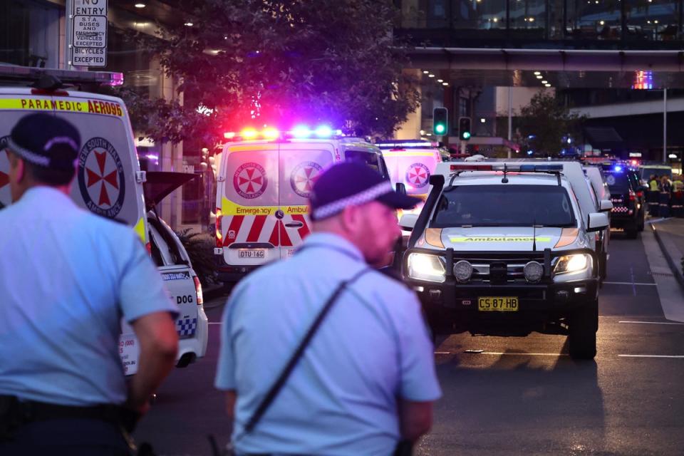 Ambulances make their way outside the Westfield Bondi Junction shopping mall after a stabbing incident in Sydney on 13 April 2024 (AFP via Getty Images)
