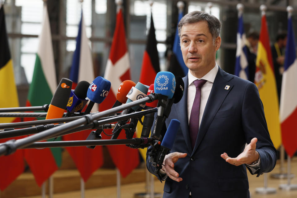 Belgium's Prime Minister Alexander De Croo speaks with the media as he arrives for a EU Summit in Brussels, Thursday, March 21, 2024. European Union leaders are gathering to consider new ways to help boost arms and ammunition production for Ukraine. Leaders will also discuss in Thursday's summit the war in Gaza amid deep concern about Israeli plans to launch a ground offensive in the city of Rafah. (AP Photo/Omar Havana)