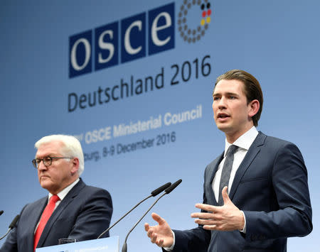 Austrian Foreign Minister Sebastian Kurz (R) and his German counterpart Frank-Walter Steinmeier address media at the 23rd OSCE Ministerial Council organized by Germany's OSCE Chairmanship in Hamburg, Germany December 9, 2016. REUTERS/Fabian Bimmer