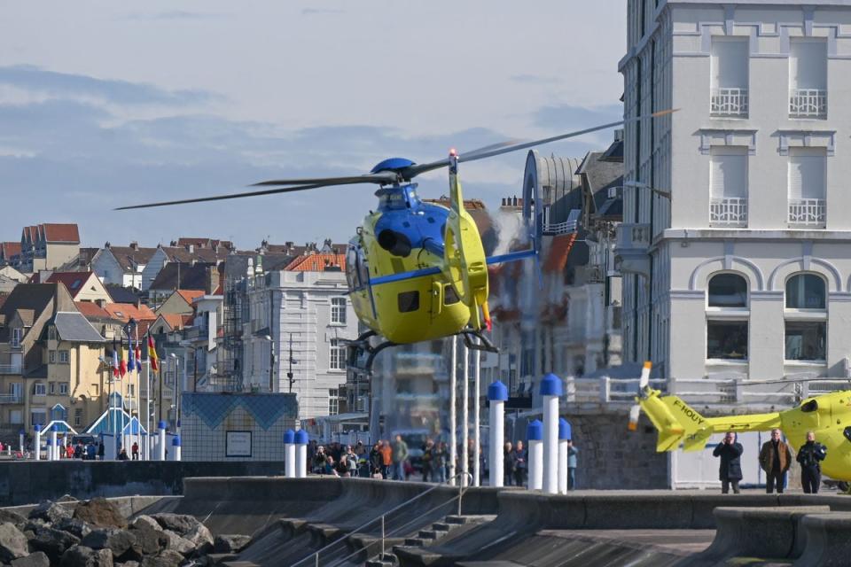 An emergency helicopter seen taking off from Wimereux beach as the Channel tragedy unfolded (AFP via Getty Images)