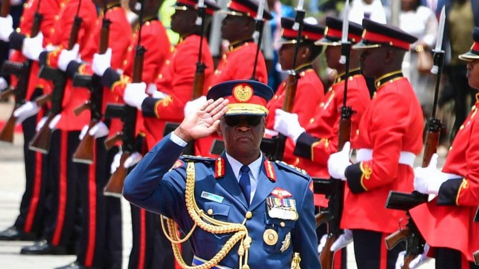 Chief Of Kenya Defence Forces General Francis Ogolla (C) Gestures As Britain'S King Charles Iii (Unseen) And Kenyan President William Ruto (Unseen) Arrive At The Tomb Of The Unknown Warrior During A Wreath Laying Ceremony At Uhuru Gardens In Nairobi On October 31, 2023.