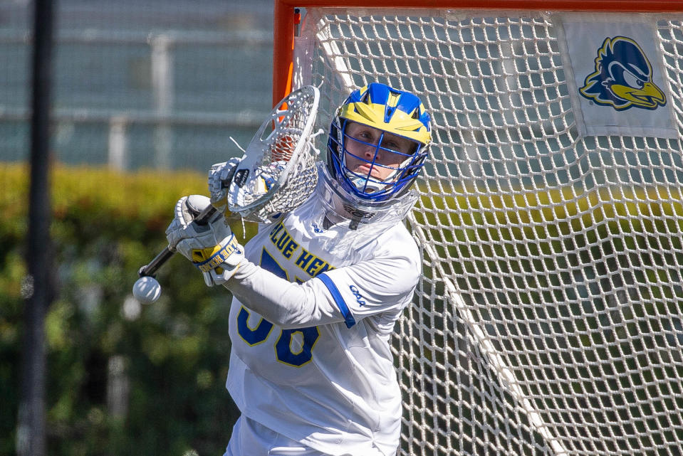 Delaware goalie Matt Kilkeary gets in the way of a shot in the CAA lacrosse final against Stony Brook at Delaware Stadium.