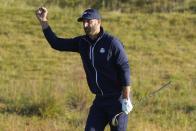 Team USA's Dustin Johnson reacts on the third hople during a foursomes match the Ryder Cup at the Whistling Straits Golf Course Saturday, Sept. 25, 2021, in Sheboygan, Wis. (AP Photo/Charlie Neibergall)