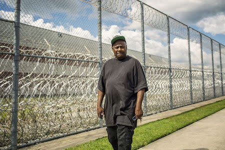 Joseph Anderson, boyfriend of Qumotria Kennedy, is shown in this handout photo provided by the American Civil Liberties Union (ACLU) October 21, 2015, walking in front of the Harrison County Adult Detention Center Gulfport, Mississippi October 6, 2015. REUTERS/William Widmer/UCLA/Handout via Reuters