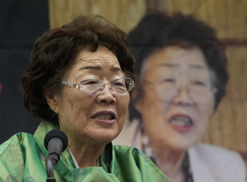 Lee Yong-soo, a South Korean woman who was sexually enslaved by Japan's World War II military, speaks during a news conference at the Korea Press Center in Seoul, South Korea, March 17, 2022. Lee is trying to persuade the governments of South Korea and Japan to settle their decades-long impasse over sexual slavery by seeking judgement of the United Nations. (AP Photo/Ahn Young-joon)