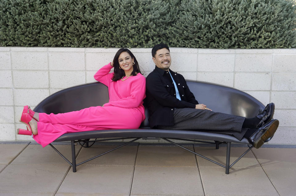 Melissa Fumero, left, and Randall Park, cast members in the Netflix series "Blockbuster," pose together for a portrait, Monday, Oct. 24, 2022, in Los Angeles. (AP Photo/Chris Pizzello)