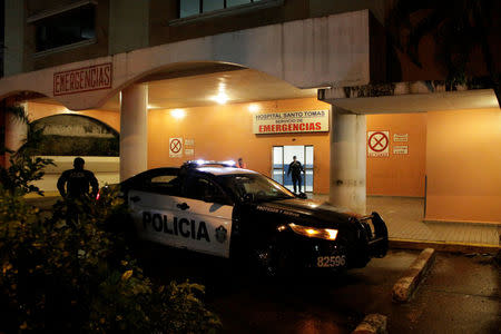 Police guard the entrance to the Emergency department of the hospital where 83-year-old former Panamanian dictator Manuel Noriega died, in Panama City, Panama, May 30, 2017. REUTERS/Carlos Lemos