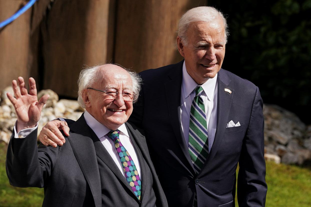 Biden poses with Higgins (Reuters)