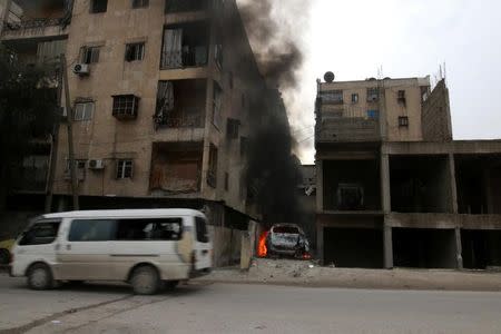 Smoke rises from a car after strikes on the rebel-held besieged al-Zebdieh district, in Aleppo Syria December 5, 2016. REUTERS/Abdalrhman Ismail