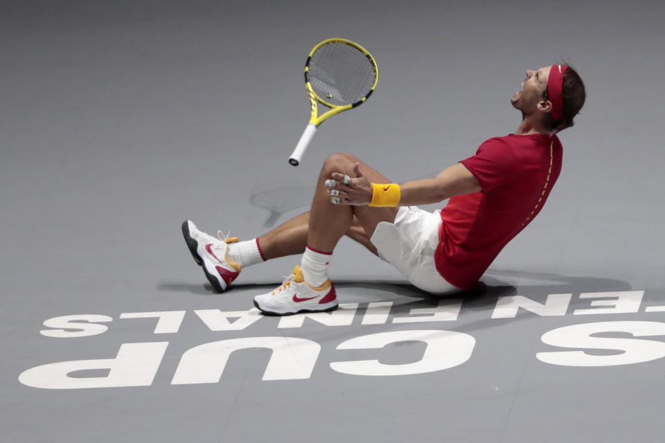 Spain's Rafael Nadal reacts after defeating Canada's Denis Shapovalov in their tennis singles match to win the Davis Cup final in Madrid, Spain, Sunday, Nov. 24, 2019. (AP Photo/Bernat Armangue)