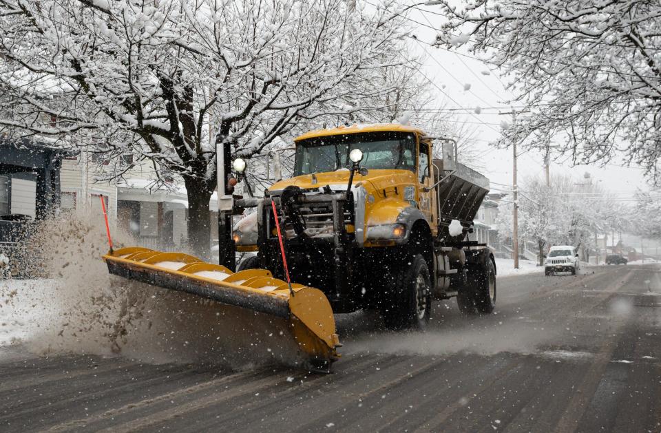 A City of Utica plow truck clears the snow and slush off of Oneida Street in Utica, NY on Tuesday, March 14, 2023.