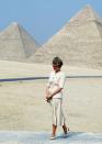 <p>Dressed in an iconic beige outfit designed by Catherine Walker, Diana, Princess of Wales, takes in the sights on an official tour of the pyramids in Giza during a May trip to Cairo in 1992.</p>