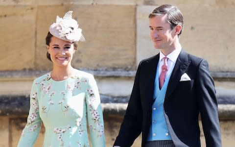 Pippa Middleton and James Matthews arrive for the wedding ceremony of Prince Harry and Meghan Markle  - Credit: AFP