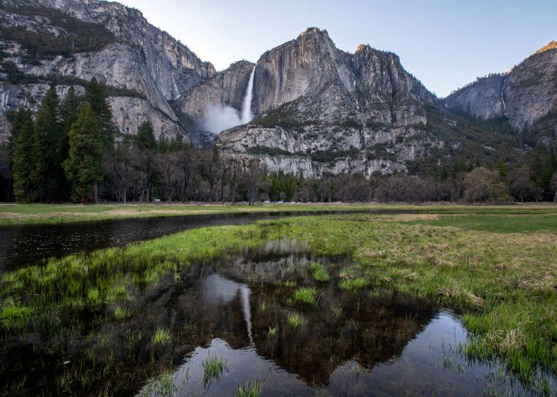 Yosemite National Park, CA - April 26: The waterfall is reflected in water in the meadow in the Yosemite Valley as the snowpact melts on Wednesday, April 26, 2023 in Yosemite National Park, CA. (Francine Orr / Los Angeles Times)