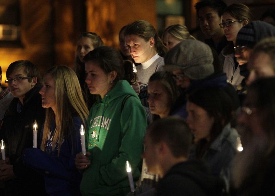 Supporters of "Missourians for Alternatives to the Death Penalty" (MADP) attend a candlelight vigil for death row inmate Joseph Franklin on the steps of St. Francis Xavier Church in St. Louis